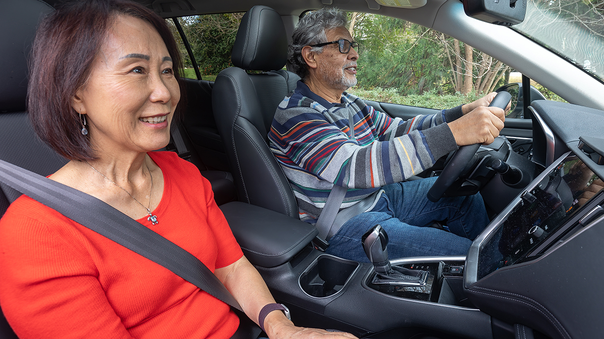 Older adult couple in car